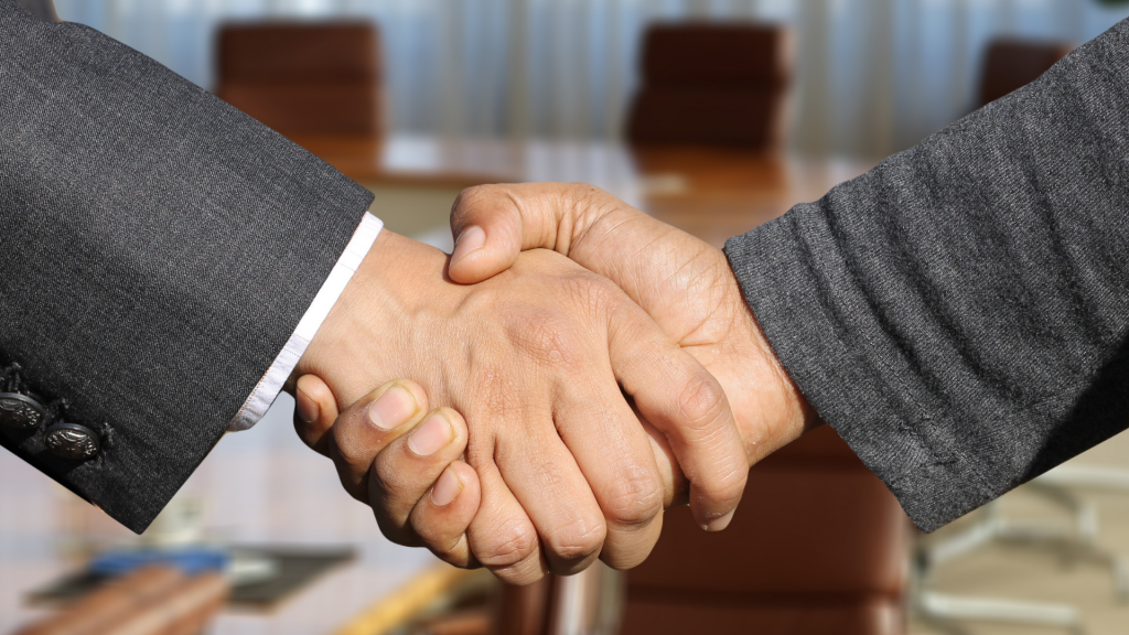 coads-shaking-hands-business-meeting